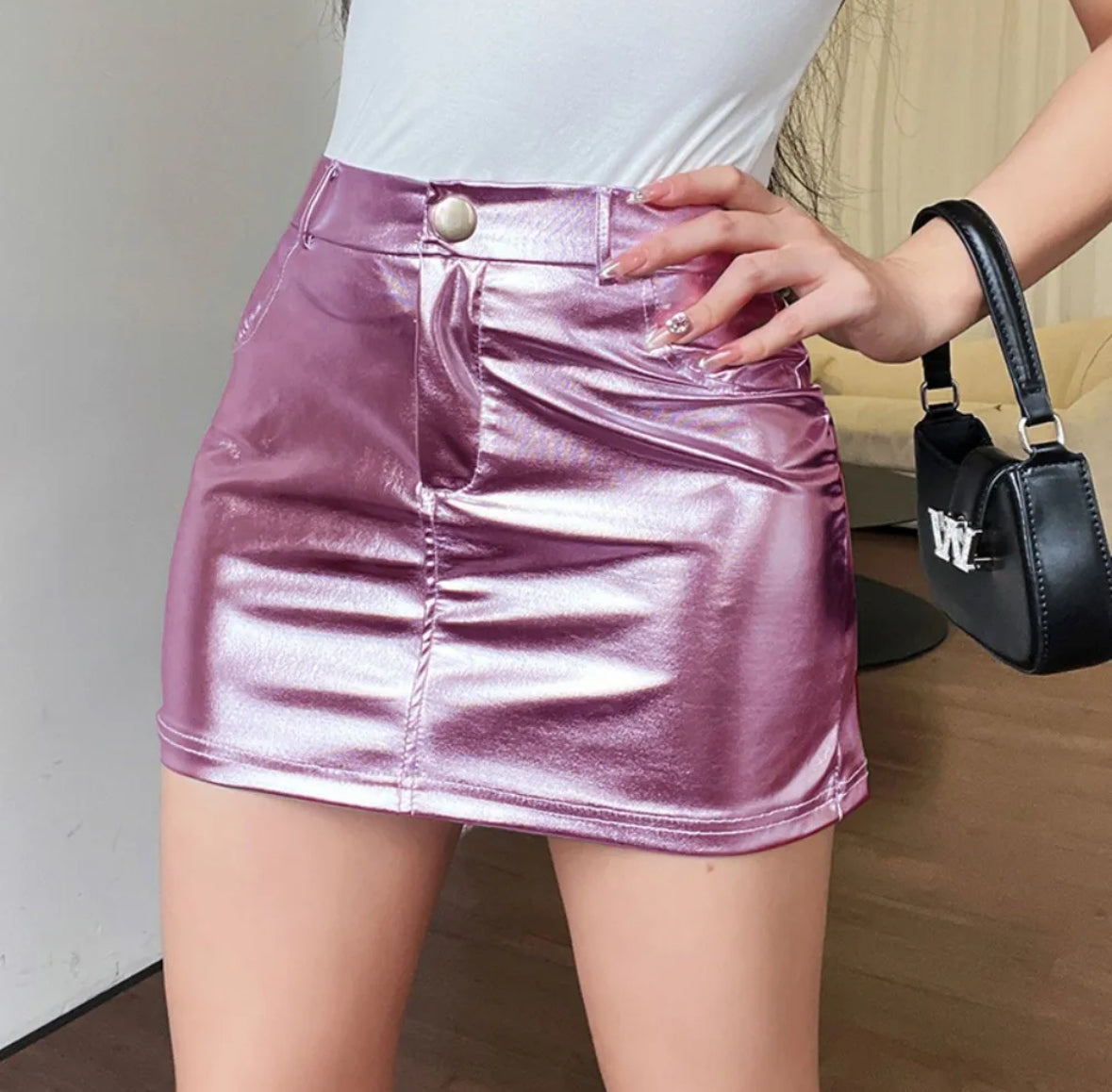 Glittery leather mini skirt